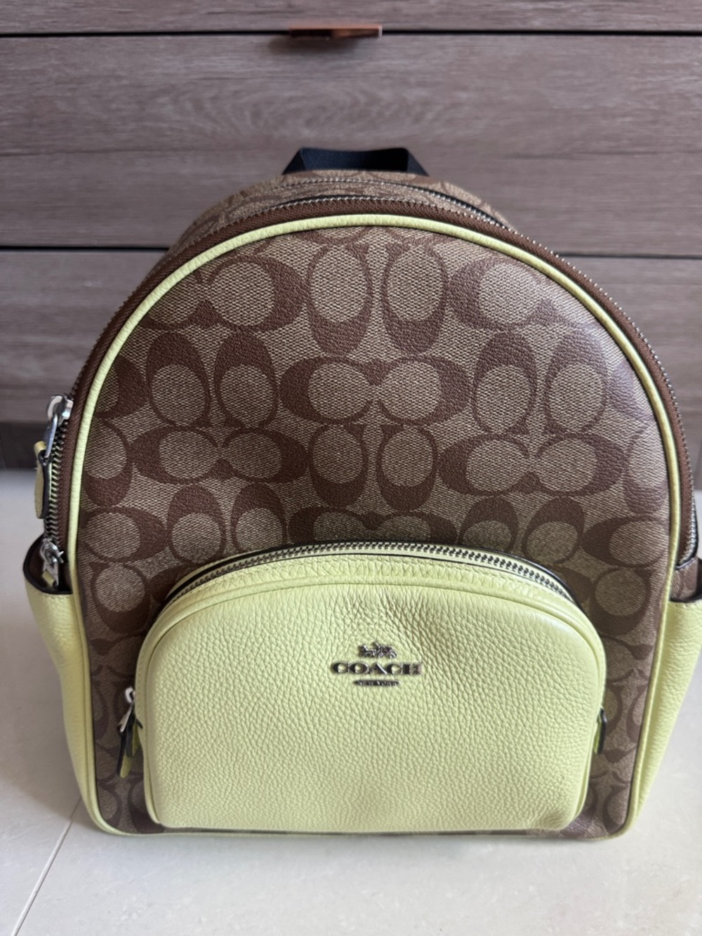 Coach Brown Signature Mini Backpack with Lemon Yellow Pocket